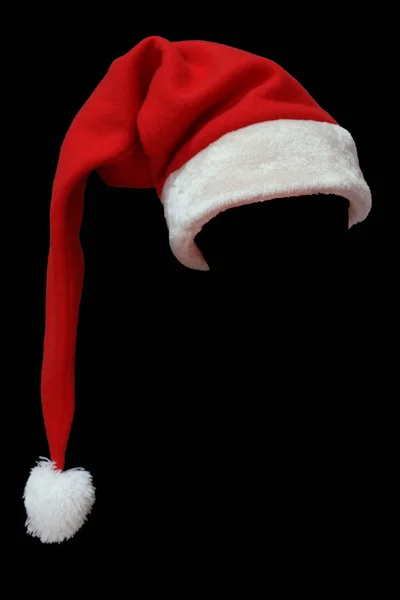 Siyah arka planda kırmızı Noel Baba şapkası