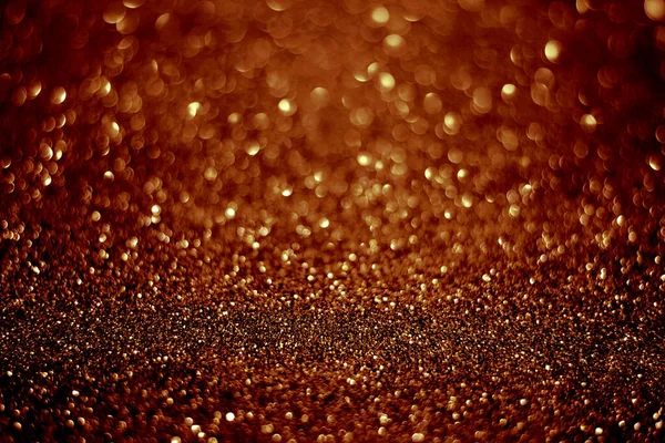 red gold background with sparkling bokeh of texture abstract