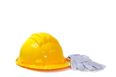İş ortamları için sarı kask ve deri eldivenler.