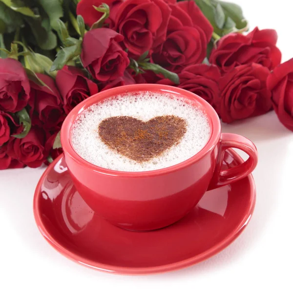 Kaffee und Rosen lizenzfreie Stockbilder