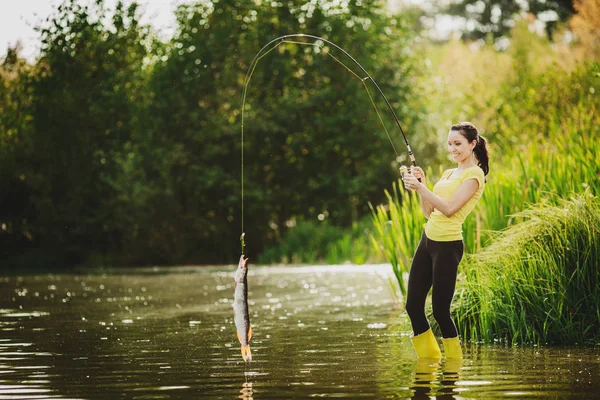 Woman Fishes River Stock Image
