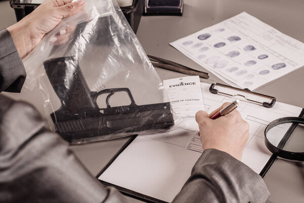 Detective  expert writes data into  