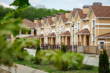 Unfinished european house of brick, still under construction.  clipart