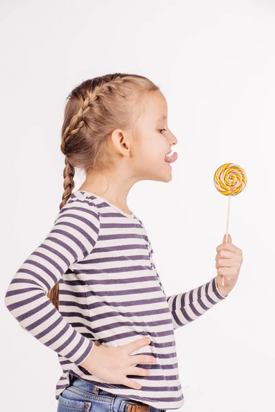 Happy girl with lollipop. — Stock Photo, Image