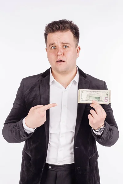 Affärsman som håller upp kontanta pengar — Stockfoto