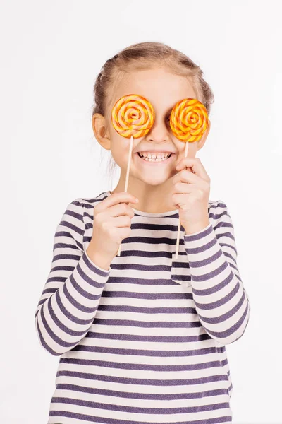 Happy girl with lollipops — Stock Photo, Image