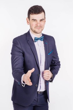 işadamı elbiseli elini sallayarak için germe