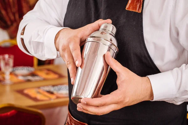 Barman with shaker in her hands — Stock Photo, Image