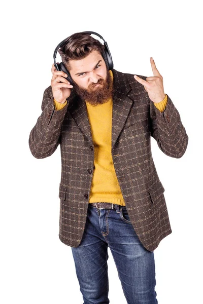 Bearded man listens to music — Stock Photo, Image