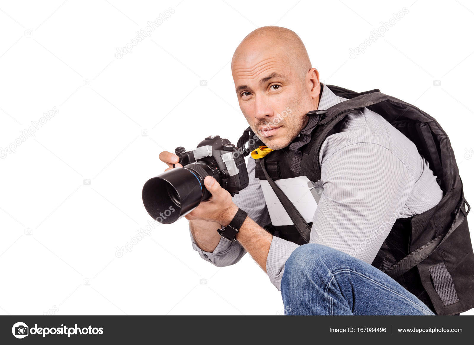 Military press photographer with a professional camera. — Stock Photo