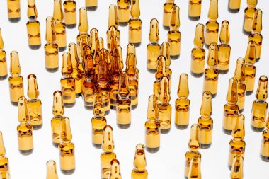 ilaç üretim. Ampul Işık arka plan üzerinde çok.