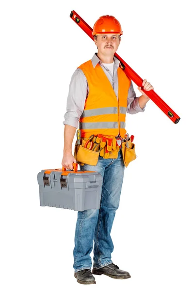Trabalhador da construção em um capacete com caixa de ferramentas — Fotografia de Stock