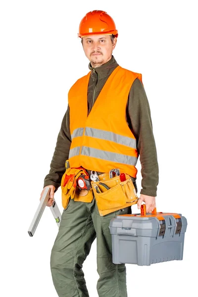 Byggnadsarbetare i en hjälm med verktygslådan — Stockfoto