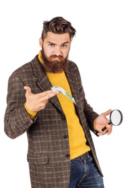 adam loking euro banka note.human em üzerinde büyüteç aracılığıyla