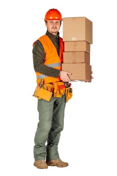 Чоловічий будівельник або ручний працівник у шоломі, що тримає купу картонного кабана — стокове фото