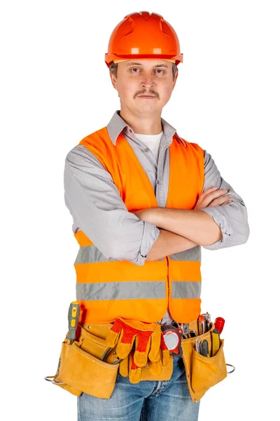 Engineer in a helmet crossed arms and looking at camera — Stock Photo, Image