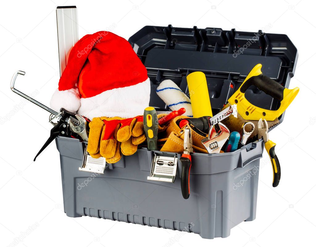 toolbox with santa hat and different hand tools