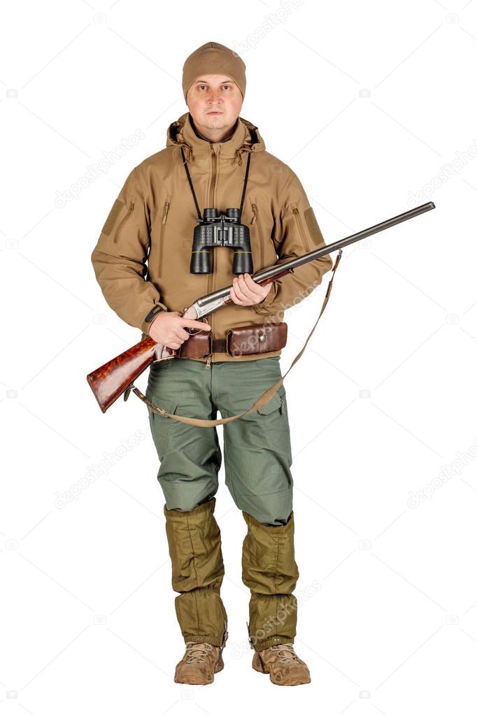 Full length portrait of a male hunter with double barreled shotgun Isolated on white background. hunting and people concept.