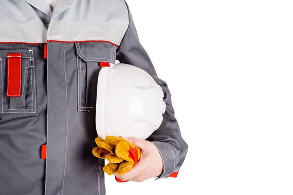 Builder pracownika z pomarańczowy kask w ręce na białym tle na biały bac — Zdjęcie stockowe