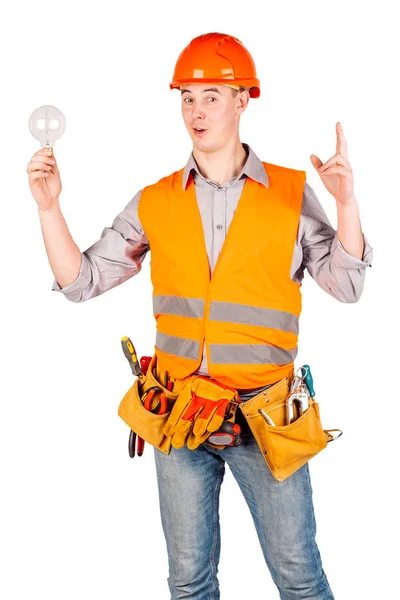 Portrait of a male builder in with helmet over white wall backgr — Stock Photo, Image