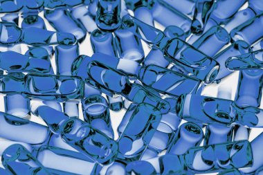 ilaç üretim. Ampul Işık arka plan üzerinde çok.