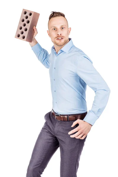 Man met baksteen in zijn handen op witte achtergrond. emoties, faci — Stockfoto