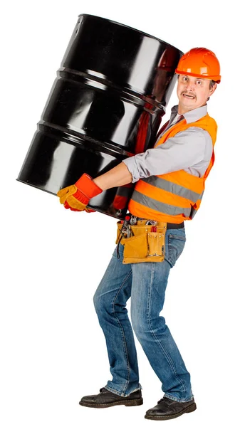 Konstruktor w kask trzyma baryłkę ropy naftowej — Zdjęcie stockowe