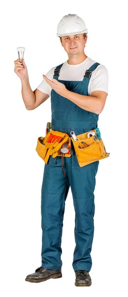 Male builder or manual worker in helmet over white wall background. repair, construction, building, people and maintenance concept — Stock Photo, Image