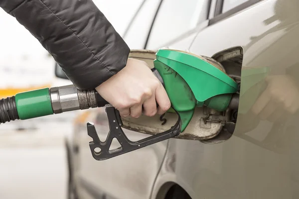 Woman Refueling Car Stock Picture