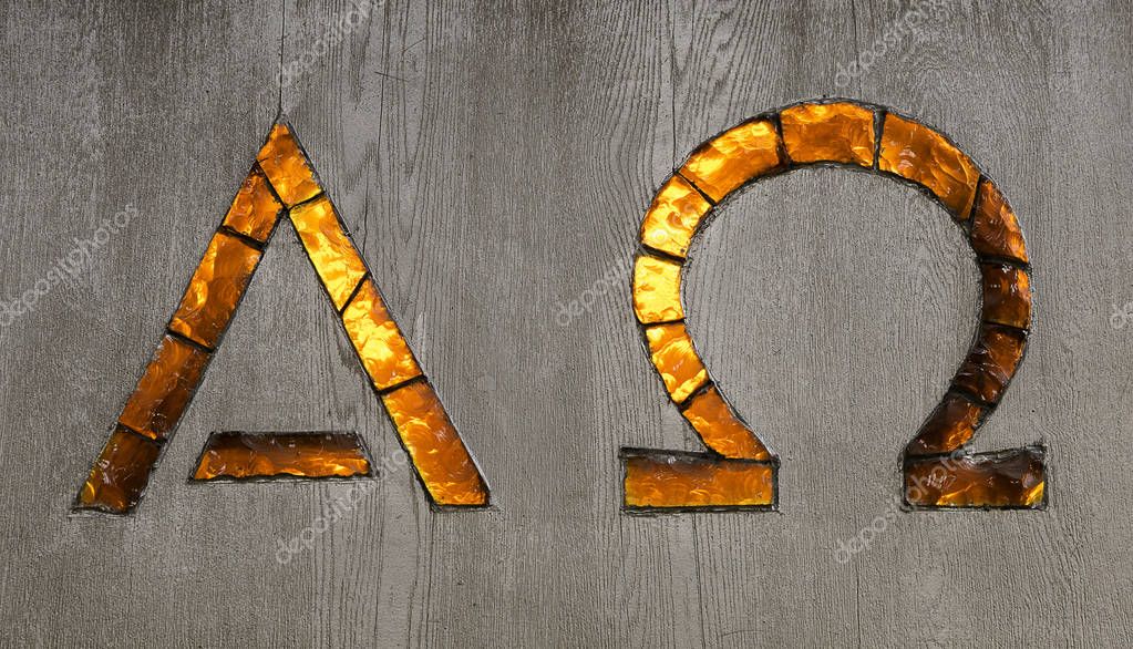 Alpha and Omega Signs in glass.