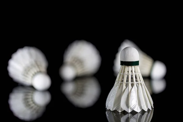 Feathered White Shuttlecock on Black — Stock Photo, Image