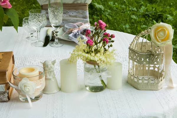 Wedding decoration in forest. Rustic wedding ceremony in forest. Vintage decoration in forest.