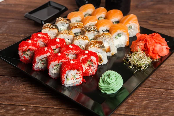 Best Types of Sushi Rolls. Philadelphia Roll, California Roll, Eel Avocado Roll. Delicious rolls and sushi with eel, salmon, shrimp, cucumber and philadelphia. Various delicious Types of Sushi Rolls