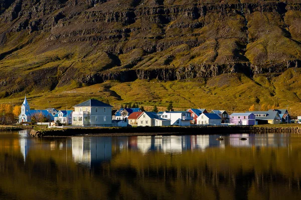 Scenic view of small town Seydisfjordur on East Iceland. The picturesque rural town. Beautiful landscape in Iceland.
