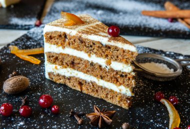 Vegan, raw carrot cake. Healthy food. Grey stone background Top View Copy space. Selective focus. Slice of cake. Healthy Homemade