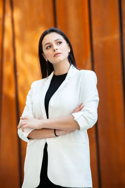 Portrait Of Successful Business Woman. Active lifestyle. Modern business girl outside. Female Leader. Beautiful russian girl. Success concept.