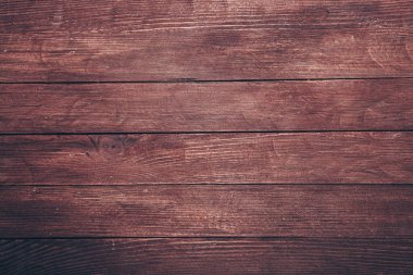 Düğümlü ve tırnak delikli klasik kahverengi ahşap arka plan dokusu. Eski boyalı ahşap duvar. Kahverengi soyut arka plan. Klasik, koyu renk, yatay tahtalar. Kopya alanı ile ön görünüm. Tasarım için arkaplan.