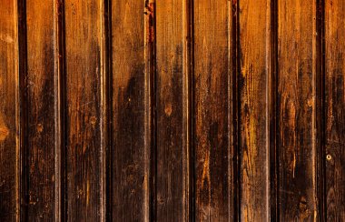 Düğümlü ve tırnak delikli klasik kahverengi ahşap arka plan dokusu. Eski boyalı ahşap duvar. Kahverengi soyut arka plan. Klasik, koyu renk, yatay tahtalar. Kopyalama alanı ile ön görünüm. 