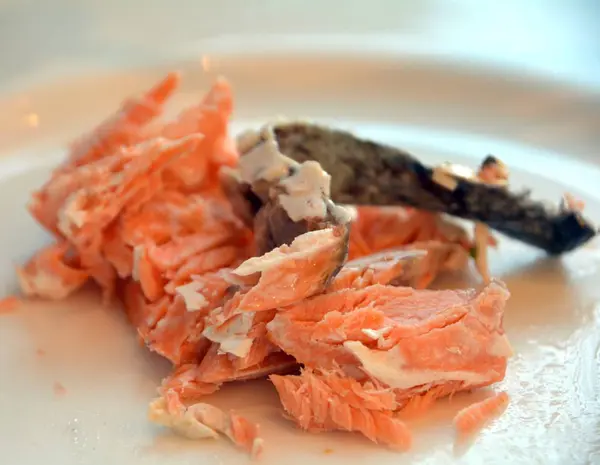 Japanese cuisine, delicious smoked salmon on a plate.Macro. — Stock Photo, Image