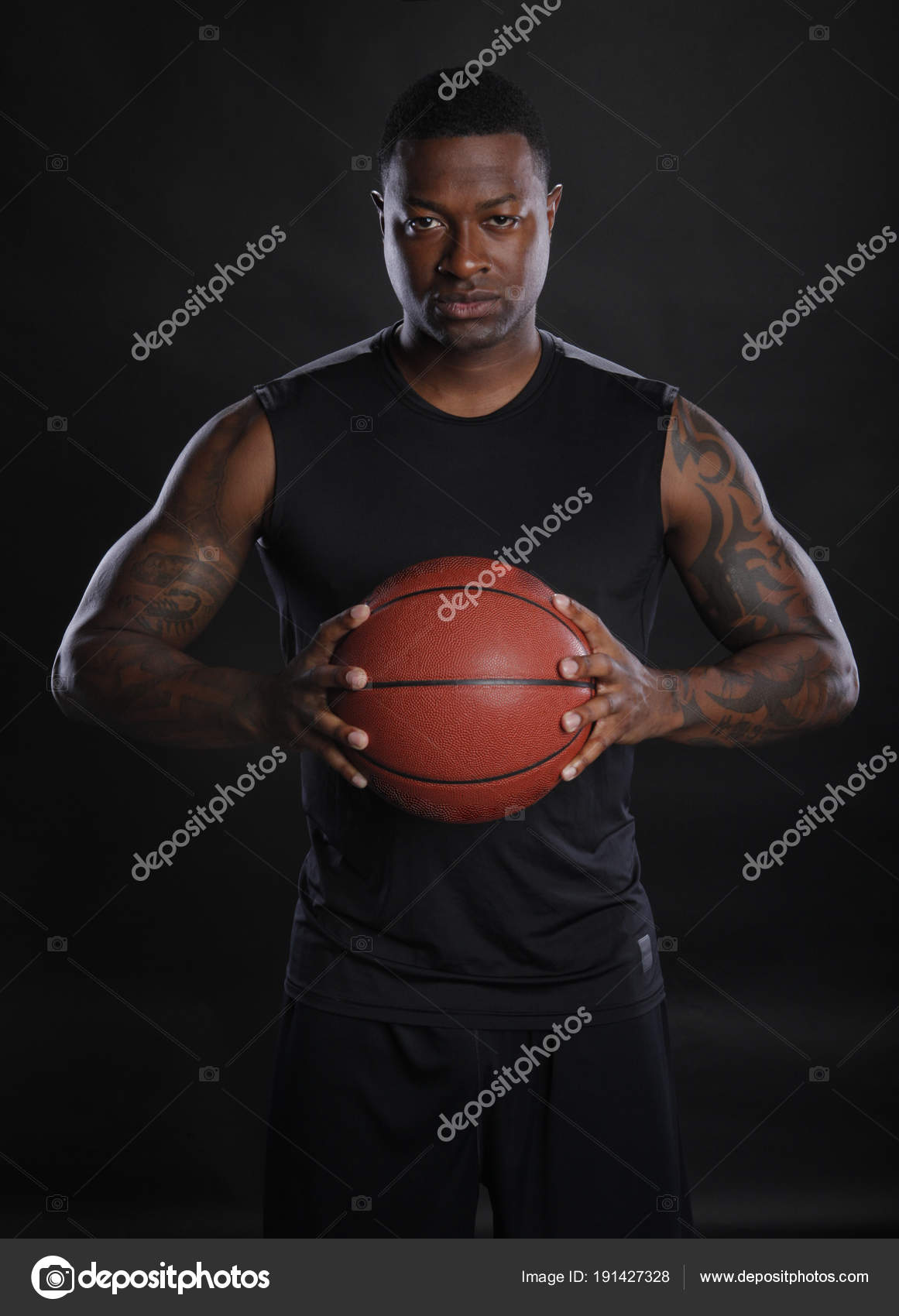 Two basketball players posing with a ball isolated on white background  Stock Photo - Alamy