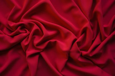 Tasarım için doğal kumaş kırmızı doku. Çuval bezi desenli arka plan. Çin Yeni Yıl Festivali ya da kırmızı sevgililer günü arkaplanı için tuval. kırmızı saten kumaş arkaplan.