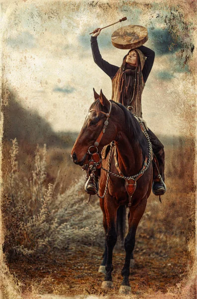 Young dreadded girl with her horse and shamanic frame drum. — Stock Photo, Image