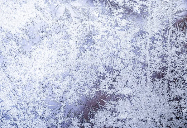 Frosty natural pattern on winter window, ornamental frost on the glass. — Stock Photo, Image