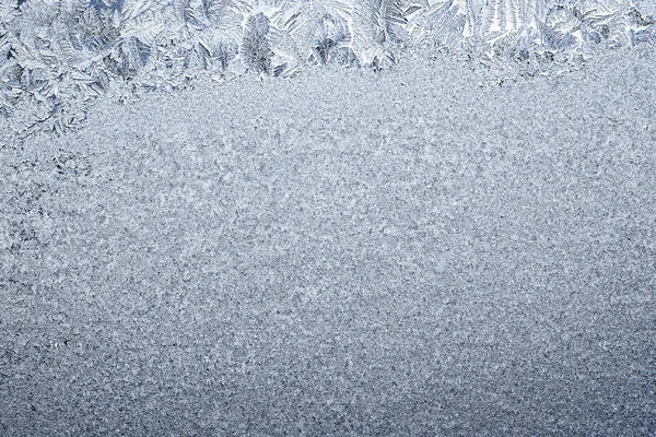 Frosty natural pattern on winter window, ornamental frost on the glass. — Stock Photo, Image