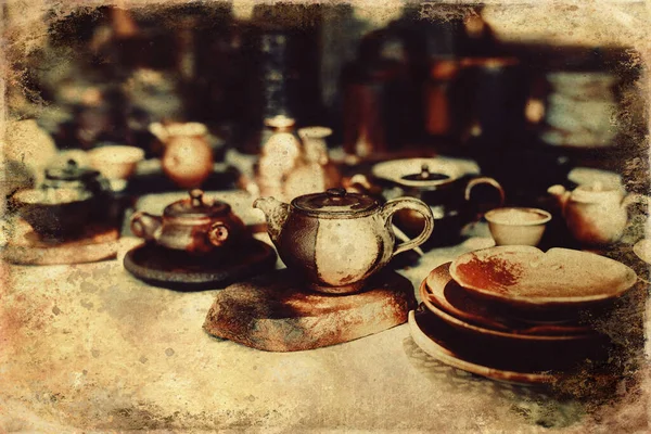 Beautiful clay teapots and mugs, fired ceramics and old photos effect with border. — 스톡 사진