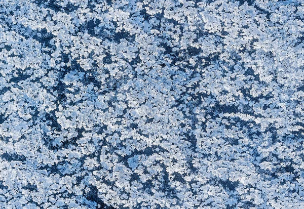 Textura de gelo no lago congelado. Fundo de cor azul. — Fotografia de Stock