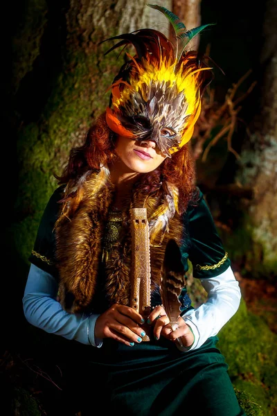 Girl Shamanic Feather Mask Historic Dress Woodland Surroundings Playing Wooden — Stock Photo, Image