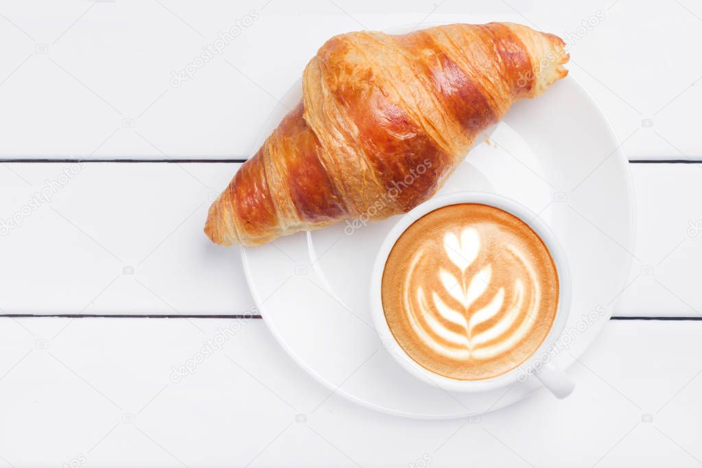 croissant coffee view from above white wooden background