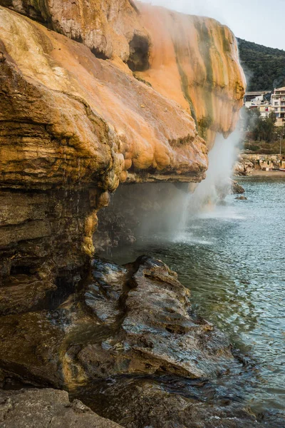 Scenic thermal waterfalls  on  beach in Loutro Edipsou, Evia, Gr — Stock Photo, Image