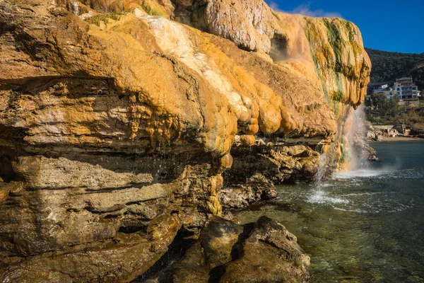 Scenic thermal waterfalls  on  beach in Loutro Edipsou, Evia, Gr — Stock Photo, Image